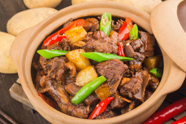 istock Stewed duck with potatoes in casserole 1366815876