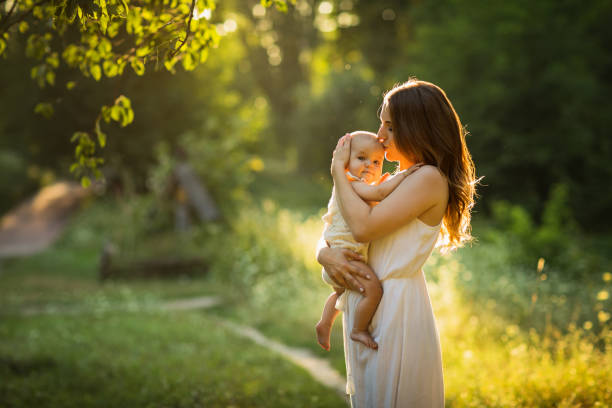 istock Young beautiful mother plays with her child 1366817374
