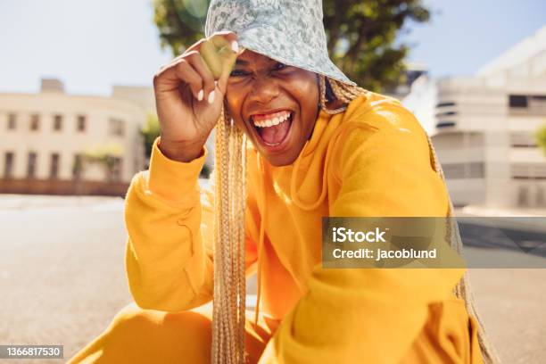 Young Woman Having Fun In The Sun Stock Photo - Download Image Now - Generation Z, Women, One Woman Only