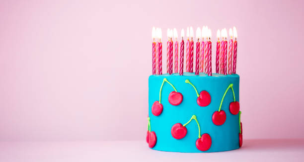 istock Colorful pink and blue birthday cake 1366820822