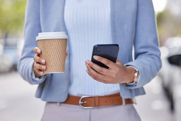 istock Cropped shot of an unrecognizable businessman using his cellphone outside 1366821296
