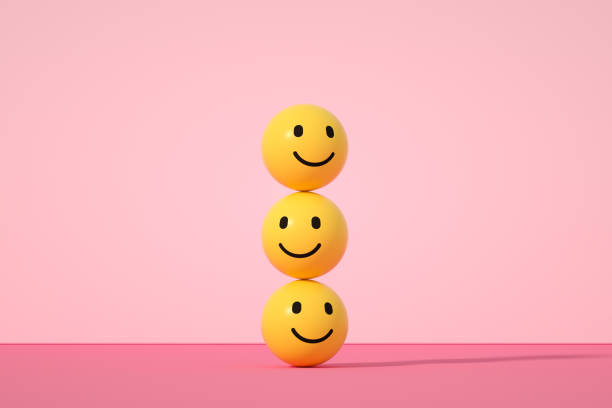 Emoji with smiley face on pink background 3d rendering of Emoji with smiley face on pink background happy face stock pictures, royalty-free photos & images