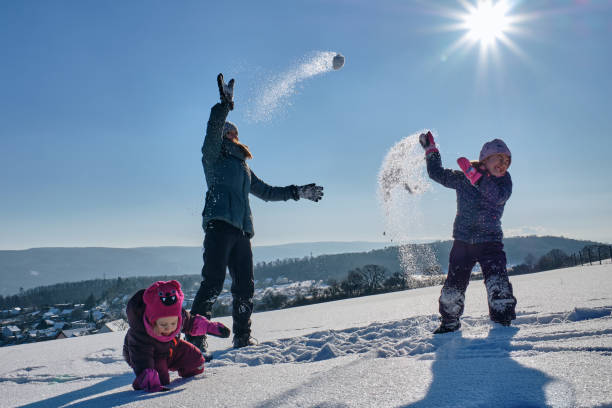 istock Snow ball fight 1366825028