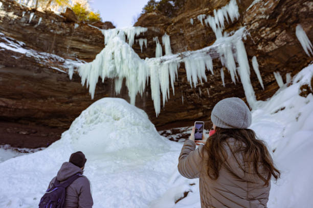 People Hiking on the Mountain with Snow