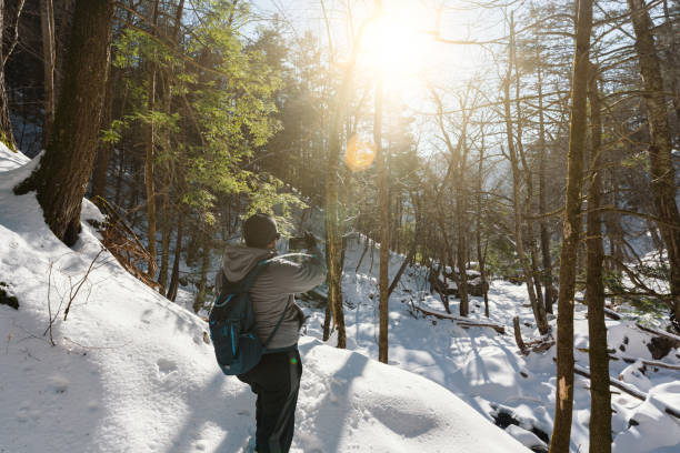 People Hiking on the Mountain with Snow