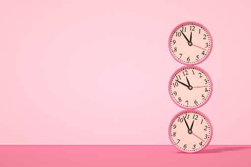 3d rendering of wall clock stack on pink color background. Countdown, reminder, deadline concept.