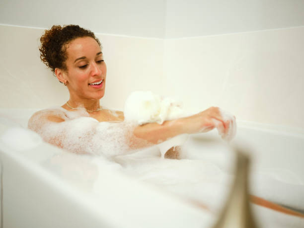 istock Woman Enjoying a Bubble Bath 1366829959