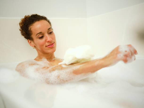 istock Woman Enjoying a Bubble Bath 1366829977