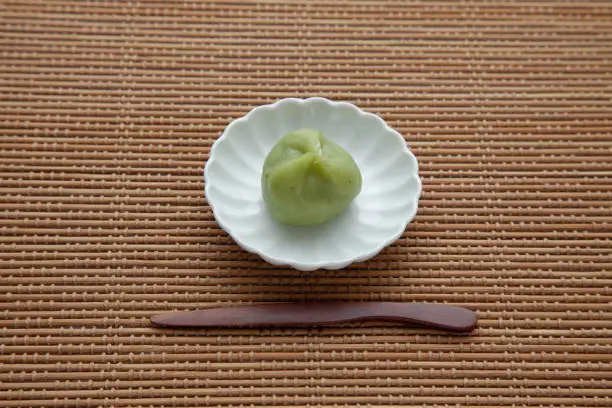 mugwort rice cake kusamochi Japanese confectionery isolated on table