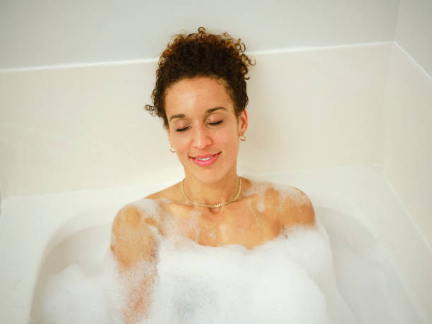 istock Woman Enjoying a Bubble Bath 1366829989