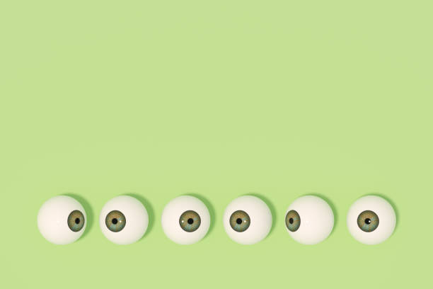 3d rendering of glossy eyeball, eye iris on green color background.