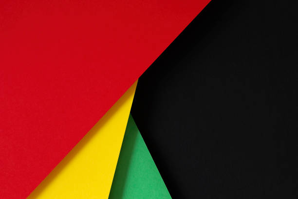 Abstract geometric black, red, yellow, green color paper background. Black History Month color background with copy space for text Abstract geometric black, red, yellow, green color background. Black History Month color background with copy space for text. black civil rights stock pictures, royalty-free photos & images