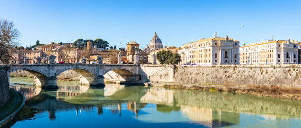 blue sky over st. peter's basilica and its reflection on tiber river - lazio stok fotoğraflar ve resimler