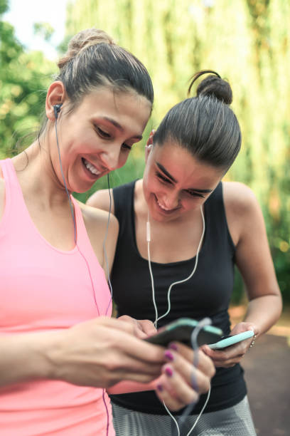 istock Smiling Female Athletes Sharing Their Workout Playlists 1366834876