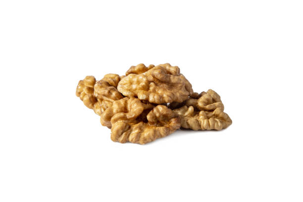 istock Handful of raw walnut on white isolated background 1366835426