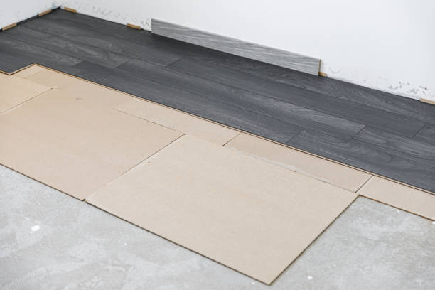 Installing a new dark wood laminate flooring with fiber insulation below
