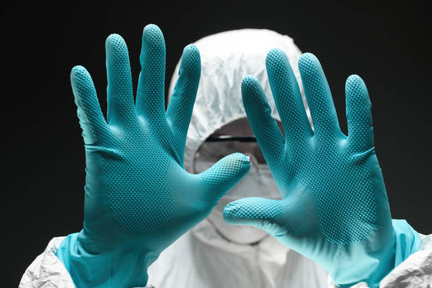 istock Vaccination center, medical worker gesturing stop signs with hands 1366844501