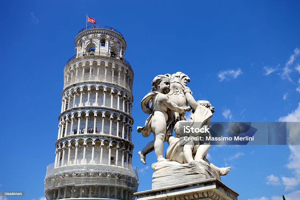 Statue Of Cherubs Statue of cherubs near the Leaning Tower of Pisa. Italy Angel Stock Photo