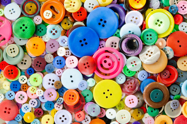 istock Colorful mixed sewing buttons background. Top view 1366847252