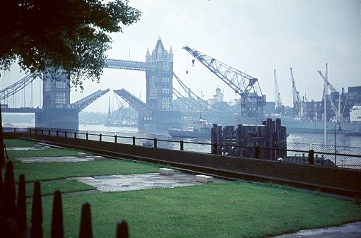 London, England, UK, 1960. View of Tower Bridge as seen from the Thames Embankment of the Tower of London.