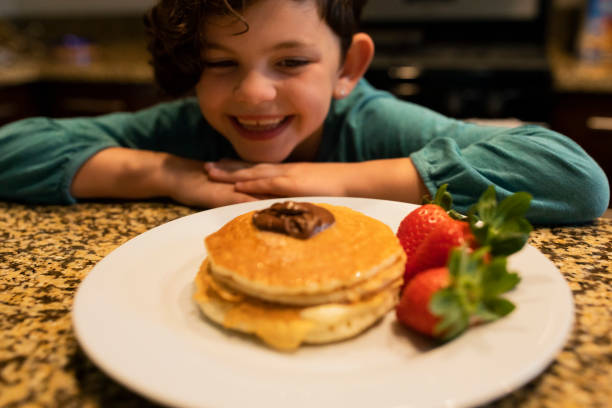 Creative Pancake Faces On Blue Plate