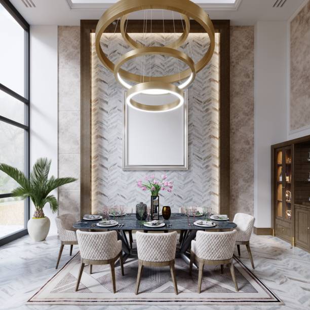 istock Designer dining table in a luxurious interior with high ceilings and a cupboard for crystal glassware and wine. 1366851651