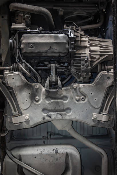 istock Underneath a motor vehicle onn a ramp in a workshop. 1366853436
