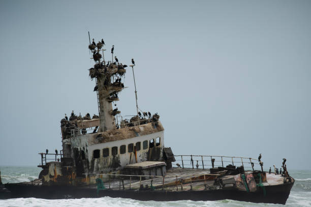 istock Sunken trawler, shipwreck. Old rusty metal ship Zeila at Skeleton Coast Namibia 1366855298