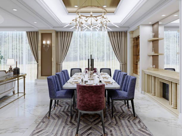istock A luxurious classic dining table in a classic dining room opposite a curtained large window. 1366855556