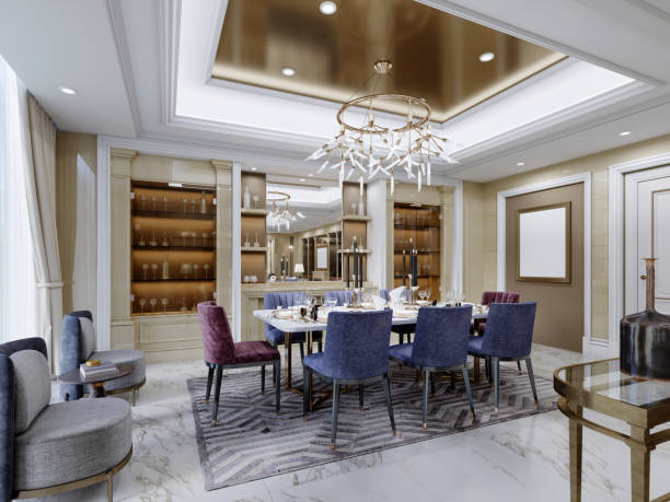 istock Luxurious dining area in a modern interior with a white table and burgundy and blue upholstered chairs near the shelves with glassware for serving. 1366855558