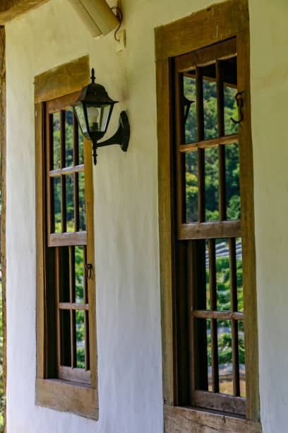 istock Wooden window in colonial mud wall 1366862731