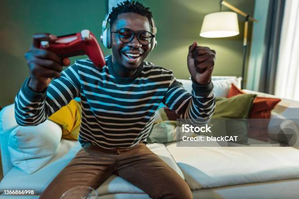 Online Playing Video Games And Winning Stock Photo - Download Image Now - Video Game, Gamer, African Ethnicity