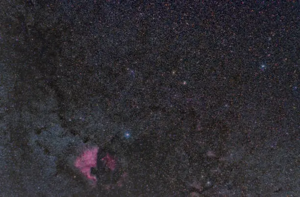 Wide field star constellation of swan with North America nebula or NGC 7000