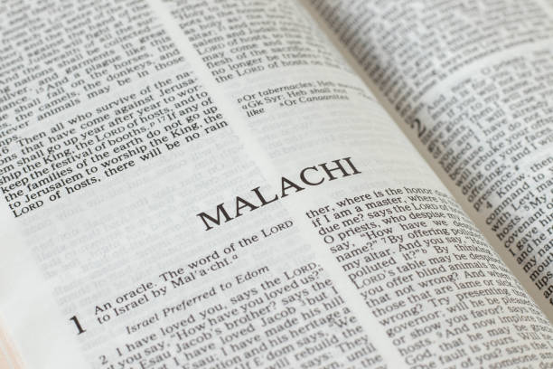 istock Malachi open Holy Bible Book close-up 1366867537