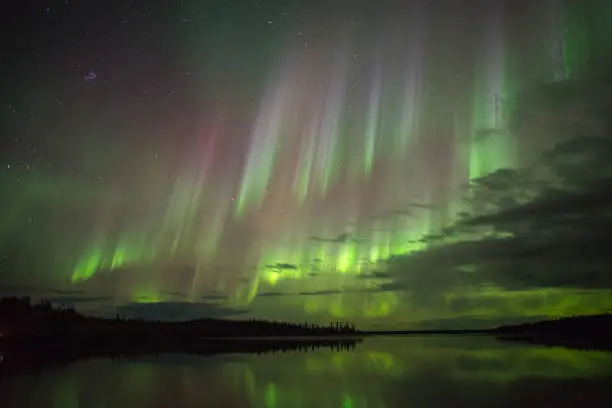 Photo of Aurora Borealis reflecting in lake, Canada