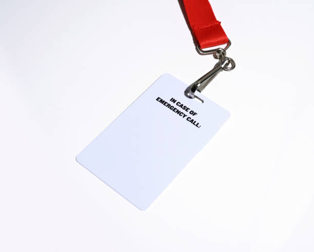 istock White badge with emergency message attached to red lanyard 1366871592