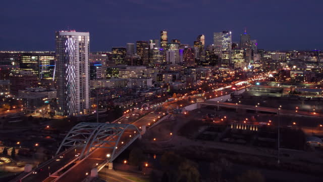 Drone View of Denver and the Speer Blvd Bridge at Night