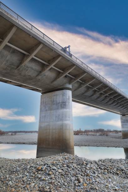 istock The pier of the bridge over the river looking up from below 1366875433