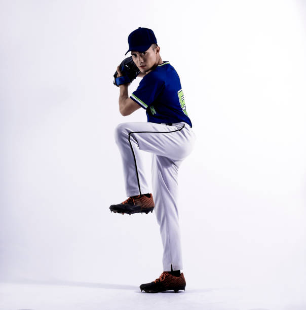 istock Full Length of Pitcher Baseball Player 1366877329