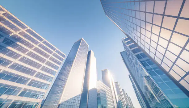 3d rendering of high building or skyscraper in city or downtown. That is real estate, property, house or residential. Include blue sky and sunlight reflection on glass wall or window. Look modern for background, concept of corporate, center of business and finance. Look up and perspective view.