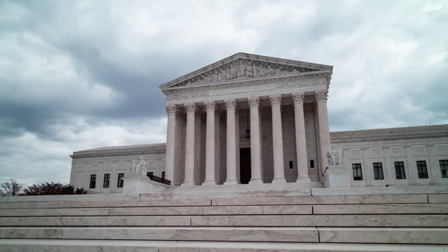 Clouds over U.S. Supreme Court Building - Washington, D.C - Panning Time-lapse
