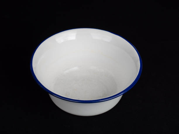 White Enamel Bowl on Black Background