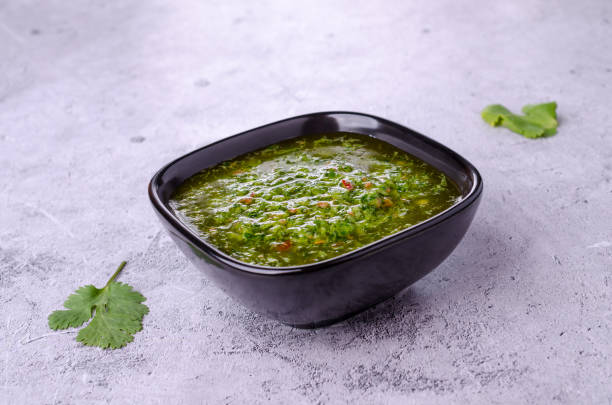 istock Green sauce in ceramic dishes 1366886684