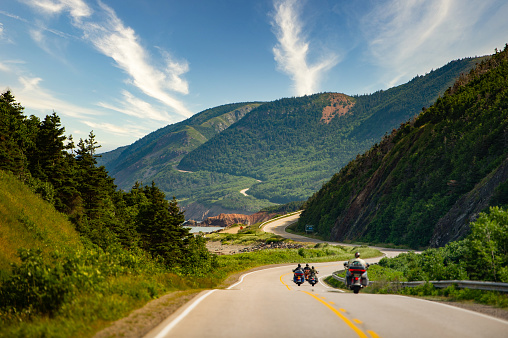 Motorcycles riding on the Cabot Trail in Cape Breton
