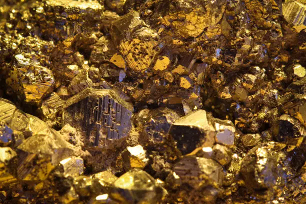 Photo of Gold colored crystals of iron pyrite