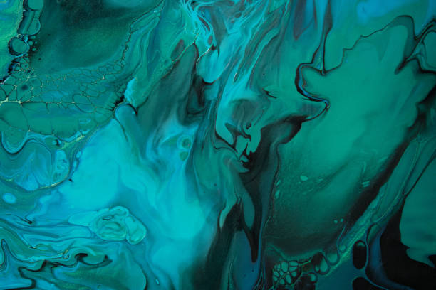 istock Fluid Art. Green and blue abstract wave swirls on black background. Marble effect background or texture 1366894468