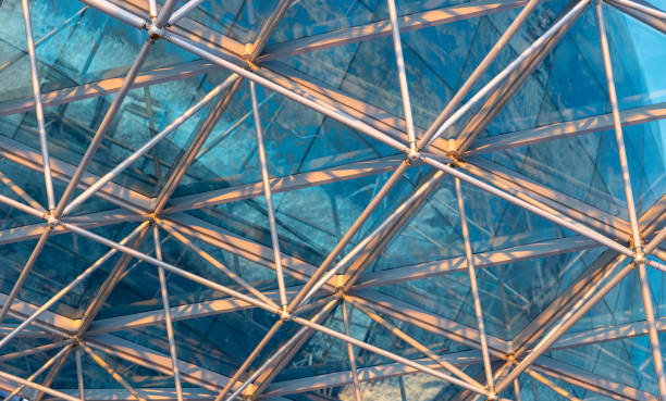 istock Spatial pattern: complex modern construction of steel and glass 1366896881