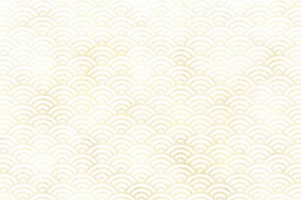 Traditional Japanese pattern (Seigaiha) background with the concept of ocean, waves and whirlpool. Gold and white. Japanese paper style texture. Elegant, luxurious and gorgeous. Traditional Japanese pattern (Seigaiha) background with the concept of ocean, waves and whirlpool. Gold and white. Japanese paper style texture. Elegant, luxurious and gorgeous. seigaiha stock illustrations