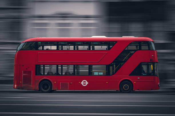 London traditional red double decker bus over blue background.