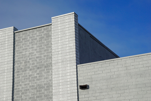 Modern urban brick building with blue sky